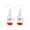 Christmas glove earrings in white enamel with red trim and green snowflake pattern - Christmas Mittens