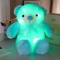 Glow-in-the-dark plush puppy toy in cyan blue with a white bow tie for kids - Blue Bear / 40 cm