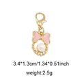 Pink enamel bow charm with white pearl and rhinestones featuring a gold lobster clasp - Bow (With Rhinestone/Artificial Pearl) / Style 16 Pearl Bow