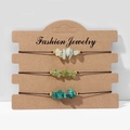 Three-piece set of green natural crystal stone bracelets on a brown display card - FK0058 Green Series Crushed Stone Set