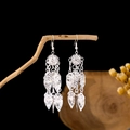 Ethnic style silver-toned long tassel earrings with hollow spherical beads and leaf charms - Hollow Ball Multi-layer Leaf Tassel Style (E1862)