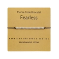 Detail of handmade Morse Code bracelet with Fearless message on display card - |fearless With Card