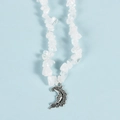 Irregular white crystal stone necklace with a silver crescent moon face pendant - Clear Quartz Moon