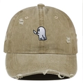 Close-up of ghost embroidery and distressed ripped details on a khaki baseball cap - One Size / Khaki