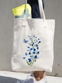 White canvas tote bag featuring delicate blue floral and butterfly watercolor pattern - Blue Flower & Butterfly
