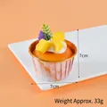 Τεχνητό cupcake μάνγκο με κρέμα και μωβ χάρτινη θήκη για διακόσμηση σπιτιού - Μάνγκο