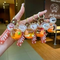 Capybara vloeibare drijfzand sleutelhanger met Mickey-hanger en bruine band - Mickey Hoofd Stijl (Willekeurige Kleur)