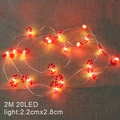 2M LED Christmas string lights with 20 red and white candy cane ornaments on burlap background - Candy Cane/2M 20LED