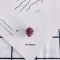 Macro detail of dark purple grape pendant with golden loop and 19x13mm size info - Purple Grape