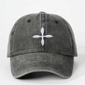 Close-up of diamond cross embroidery on a vintage washed cotton baseball cap texture - One Size / Black
