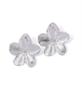Detail showing high-polish silver flower earrings with fine brushed metal texture - Silver