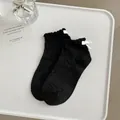 Calcetines negros de algodón estilo Lolita con volantes de encaje y lazos blancos - Talla única / Calcetines negros con nudo blanco