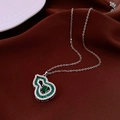Detail of 18K gold plated gourd pendant with green emerald and white crystals - Silver Emerald Gourd Pave Style (32#)