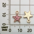 Pink enamel star pendant in golden alloy with measurement grid showing actual size - Star 10x10mm