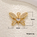 Detail view of gold butterfly pendant with crystals and dimensions 16mm x 22mm - Gold Zirconia Butterfly
