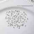 Mix of 100 mini clear flatback nail crystals in assorted geometric shapes for DIY art - Approx. 100 Pcs / Gold / White Zirconia