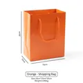 Orange textured paper watch gift bag with woven handles, 16x10x20cm elegant packaging - Paper Handbags / Orange