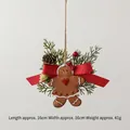 Pendaglio omino di pan di zenzero con cuore, nastro rosso e pigna, decoro da 16cm - Omino di pan di zenzero con cuore / 41g