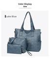 Conjunto de tres bolsos azul lago que muestra los detalles de cuero sintético texturizado - Tote Grande + Bandolera Mediana + Estuche Pequeño / Azul lago