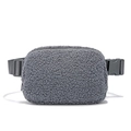 Fleece waist bag in grey with adjustable strap and buckle on a white background - Gray