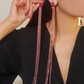 Elegant long tassel drop earrings with sparkling pink rhinestones on a female model - Silver Pink Purple Rhinestone Fringe