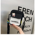 Canvas messenger bag in black and white patchwork with a cute cartoon pin and charm - Black without Pendant