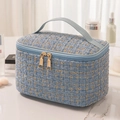 Light blue tweed makeup bag with woven texture, golden zipper and top handle - Blue