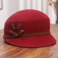 Detail of wool cloche hat with brown ribbon and golden wheat metal accent - M (56-58cm) / Burgundy