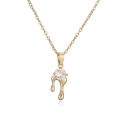 Collana minimalista placcata oro con ciondolo lava e zircone su sfondo bianco puro - Oro