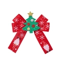 Detailed view of red Christmas bow clip featuring white snowflakes and a green glitter tree - Red