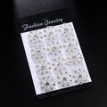 Set of 6 pairs silver flower stud earrings with rhinestones on fashion jewelry card - Silver Tone White Rhinestone Hollow Flower Style (KZ033-2)
