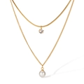 Double-layered gold titanium steel necklace featuring a zircon charm and white pearl pendant - Gold