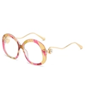 Fashionable round sunglasses featuring colorful geometric patterns and pearl wave temples - Pink Frame Clear Lens