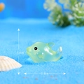 Glow-in-the-dark green resin dolphin figurine mini ornament measuring 2.6cm x 1.6cm - Green