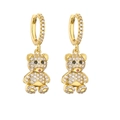Macro shot of bear drop earrings with gold plating and white sparkling cubic zirconia - Gold Panda/Bear
