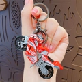 Roter und weißer Sportmotorrad-Schlüsselanhänger mit Renndekor und Metallclips - Rot