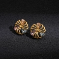 Detailed close-up of gold flower stud earrings with pear-shaped multicolor crystals - Earrings (Gold Real Gold Plated)