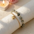 Matching couple bracelets with heart charm and grey natural stone beads on display - Grey Bead Chain & Gold Thin Chain - Heart Pendant