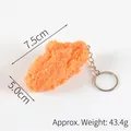 Realistic fried chicken nugget keychain made of PVC, golden yellow color, 7.5cm long - Realistic Chicken Wing with Keyring