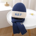 Detailed view of kids navy blue knit hat and scarf set with NOT embroidery detail - Set / Blue