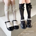 Wadenhohe Socken mit Spitzenschleife in Schwarz und Weiß im japanischen JK-Stil - Einheitsgröße / Hohlstreifen Schwarz