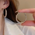 Detailed close-up and on-ear look of classic silver geometric hoop earrings for women - 5# Silver Smooth Small Hoop (Silver Earring Post)