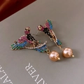 Detail of vintage bird earrings featuring colorful rhinestones and gold pearl drops - Parrot Pearl Earrings - Multi-color (With Silver Pin)