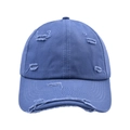 Close-up of blue distressed baseball cap featuring vintage ripped details and washed cotton - Blue