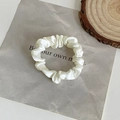 Elegant white silk scrunchie with a satin finish for minimalist women's hairstyles - Solid White