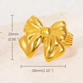 Macro shot of gold double butterfly ring showing detailed wire texture and 28mm dimensions - Bowknot Ring