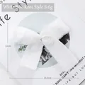 Plush white felt Christmas tree bow ornament, handcrafted teddy fabric bow tie decor - Teddy Fleece / White