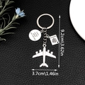 Silver travel keychain with passport, airplane charms and Every Journey engraved tag - Plane Passport Everyjourney Tag (ER681)