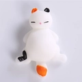 Calico cat squishy stress relief toy with cute ears and soft squeeze texture - Naughty Calico Cat