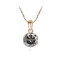 Macro detail of 1 carat moissanite pendant with 6-prong rose gold setting on chain - 1 Carat 6.5mm / Gray